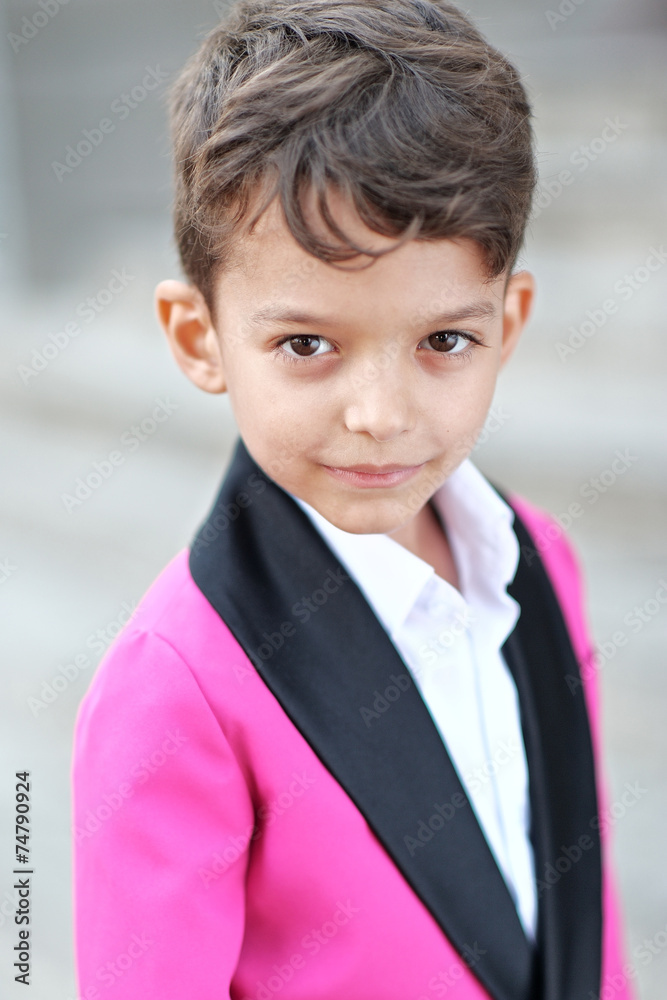 portrait of a little boy in a business style portrait of a little boy in a business style