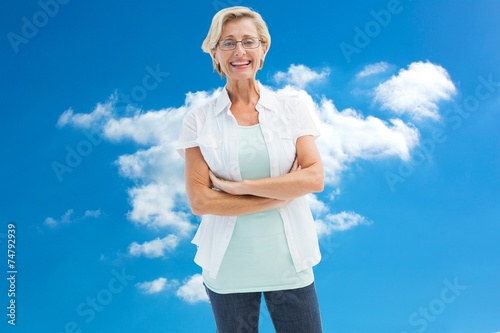 Composite image of happy mature woman with glasses