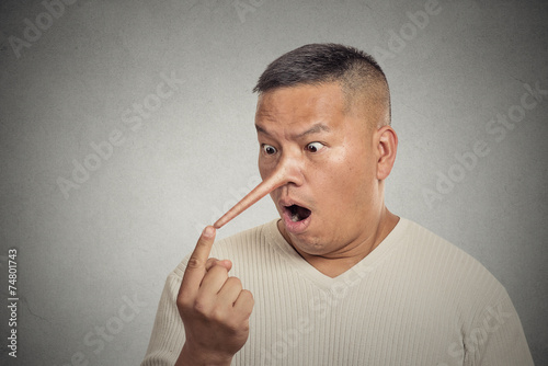 Photo Liar man with long nose isolated on grey wall background
