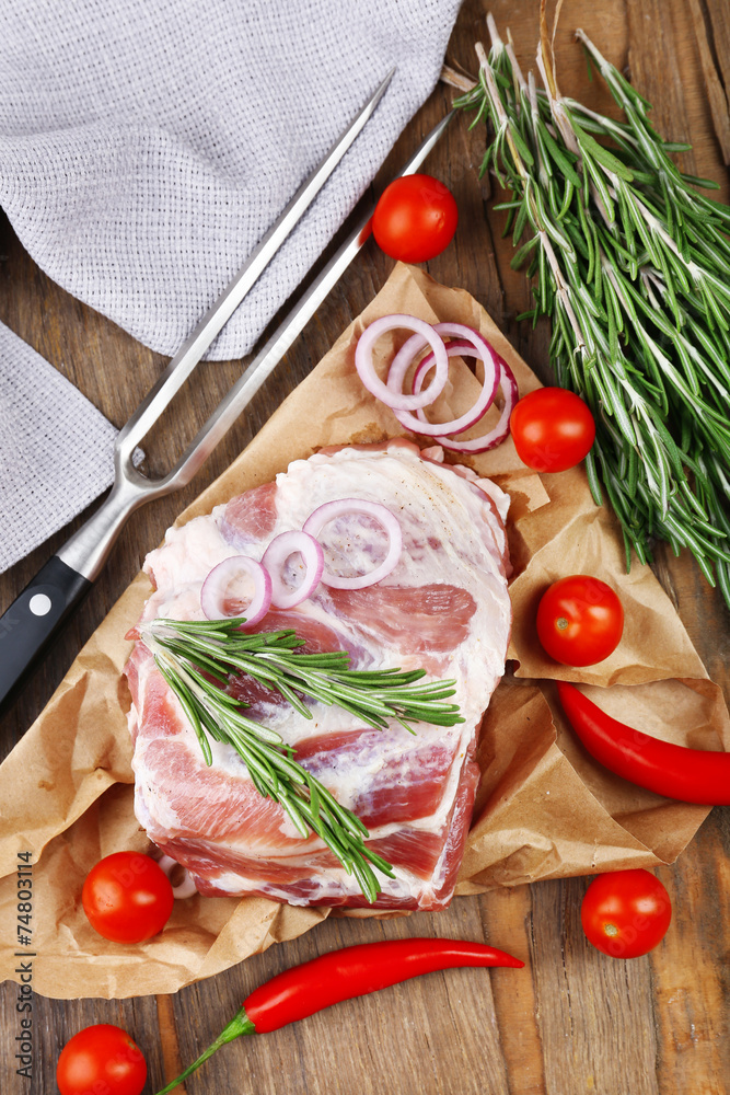 Raw meat on wooden table, close-up