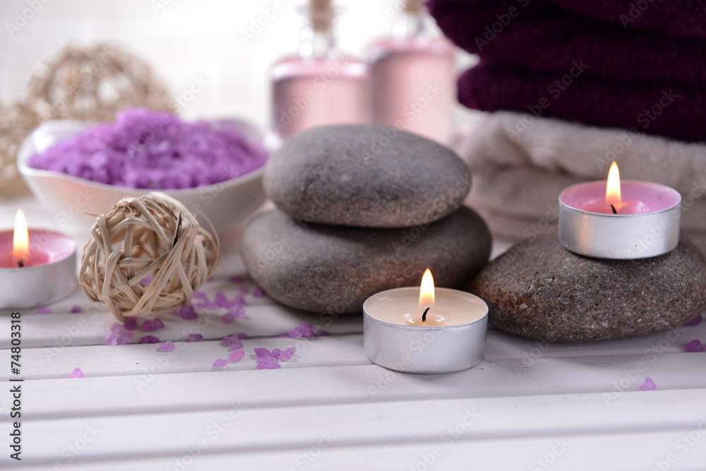 Composition of spa treatment on table on white background