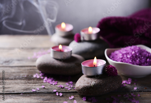 Composition of spa treatment on table on grey background