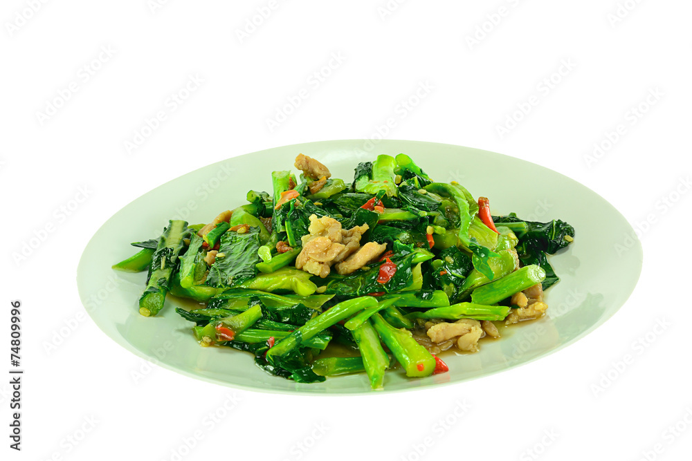 kale vegetable fried with oil and pork on plate kale vegetable fried with oil and pork on plate