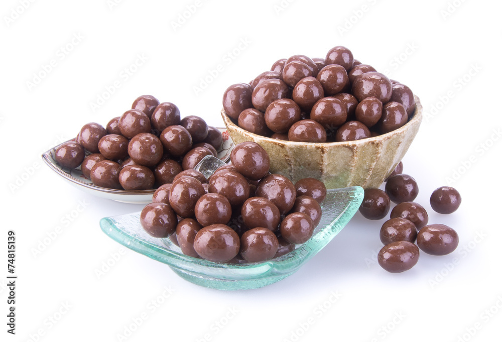 chocolate balls. chocolate balls in bowl on a background chocolate balls. chocolate balls in bowl on a background