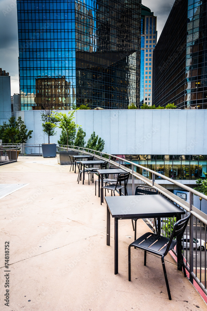 Dining area and modern buildings in downtown Charlotte, North Ca