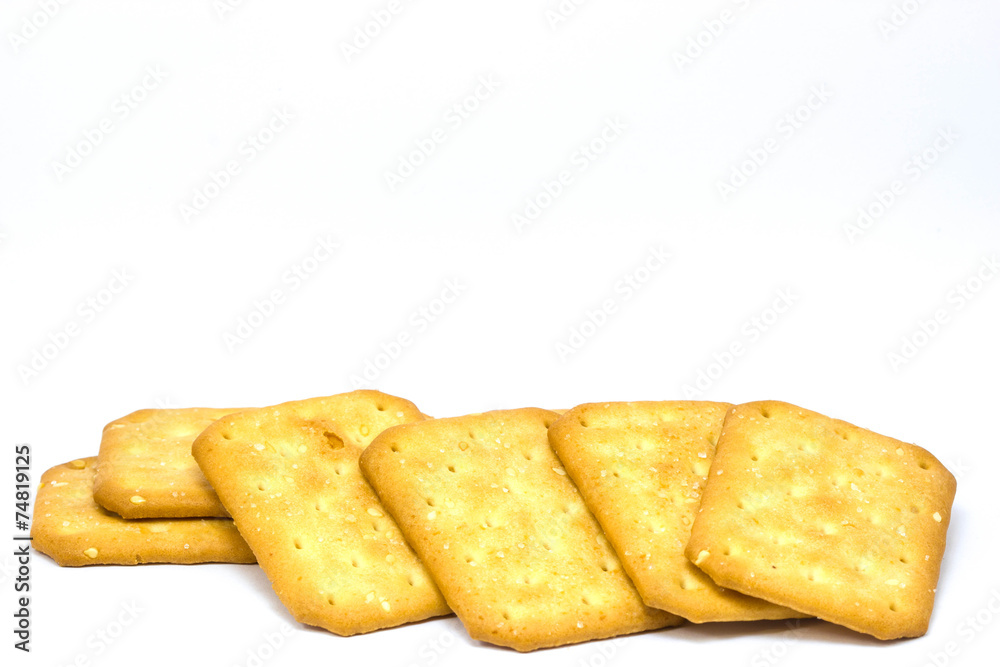 Biscuit with white sesame seeds on white background Biscuit with white sesame seeds on white background