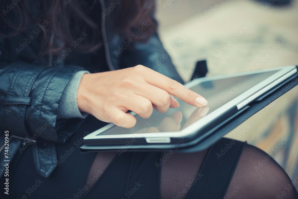 close up of woman hands using tablet close up of woman hands using tablet