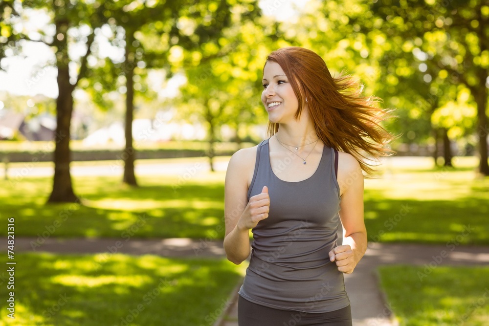 Portrait of a pretty redhead running Portrait of a pretty redhead running