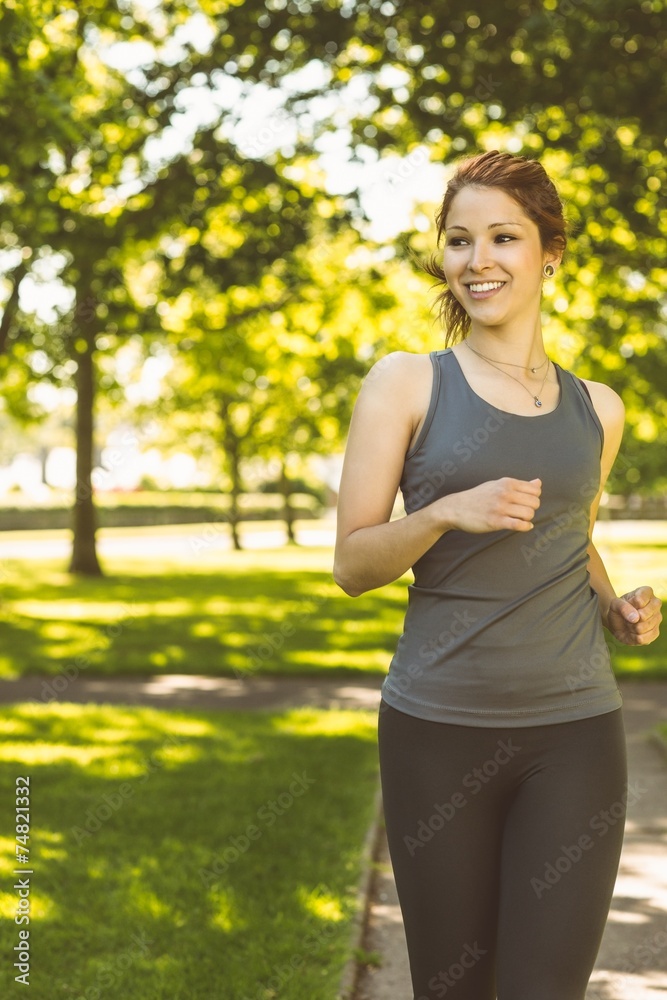 Portrait of a pretty redhead running Portrait of a pretty redhead running