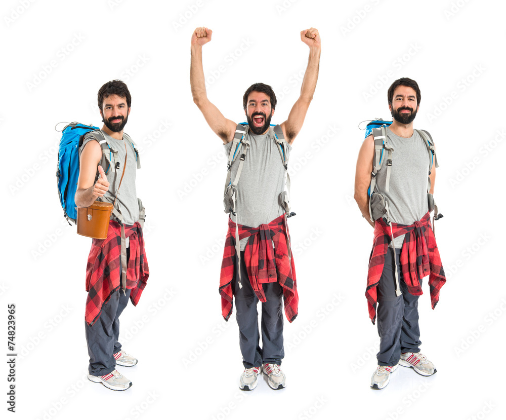 Lucky backpacker over isolated white background Lucky backpacker over isolated white background