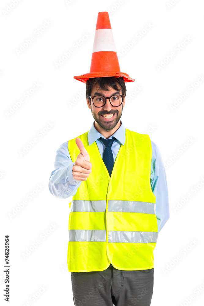 Workman with thumb up with traffic cone like hat Workman with thumb up with traffic cone like hat