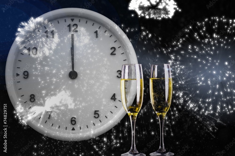 Fototapeta premium Composite image of clock at midnight