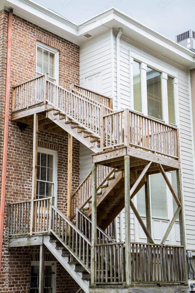 New Wood Steps Outside Old Wood and Brick Homes