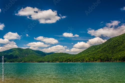 Mountains along the shore of Watauga Lake, in Cherokee National © jonbilous