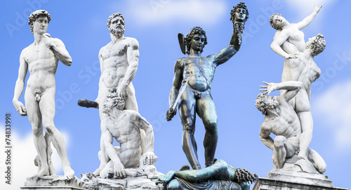Perseus holding head of Medusa,.Michelangelo's David,.Hercules a