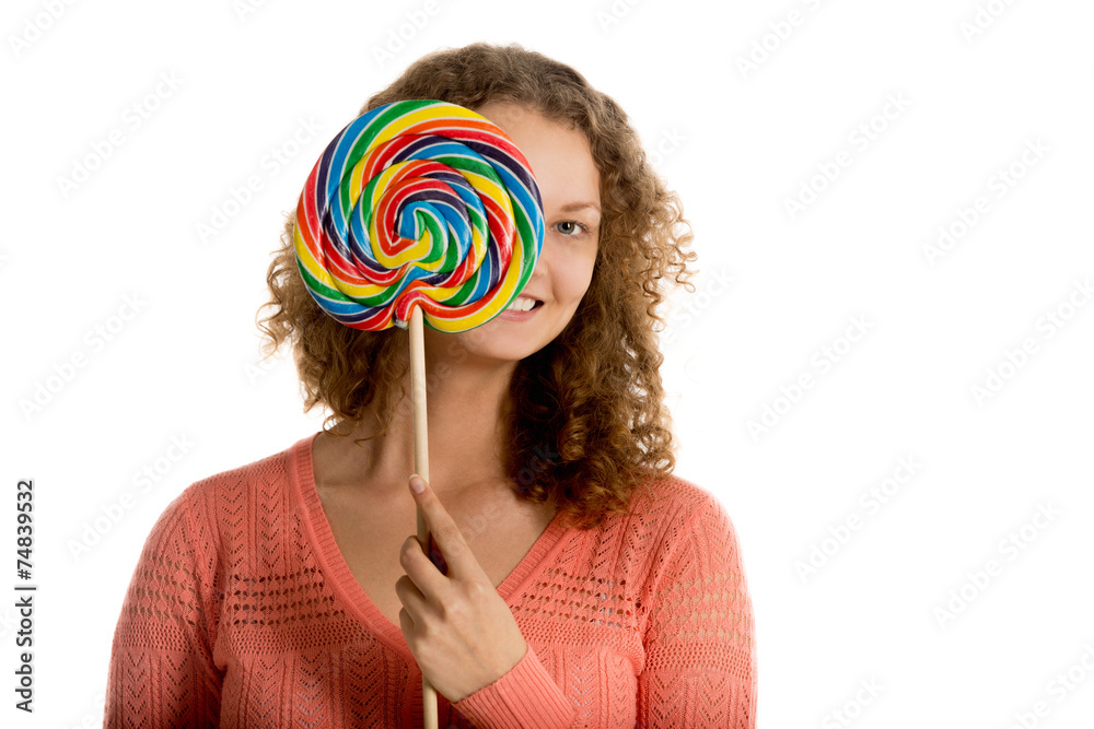 Girl hides behind giant lollypop
