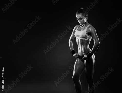 female in sports clothing relaxing after workout