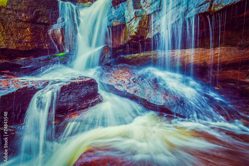 Tropical waterfall photo