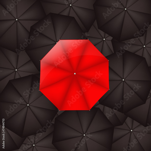 Red Umbrella Against Black Umbrellas