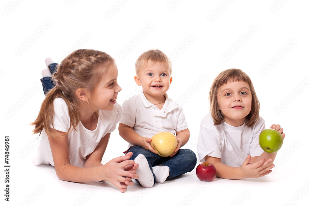Happy family sisters and brother with apples Happy family sisters and brother with apples