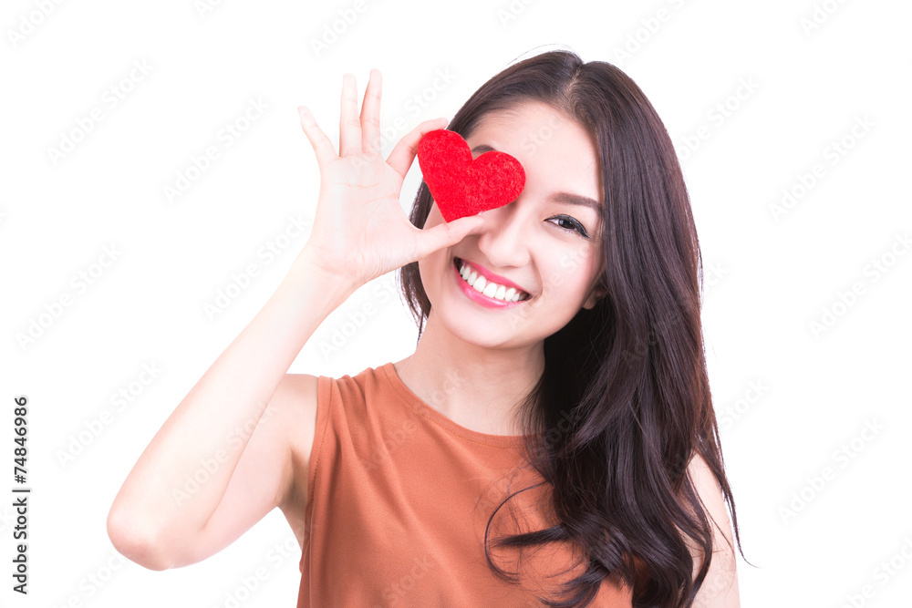 Valentine's Day. Beautiful smiling woman with a gift in the form