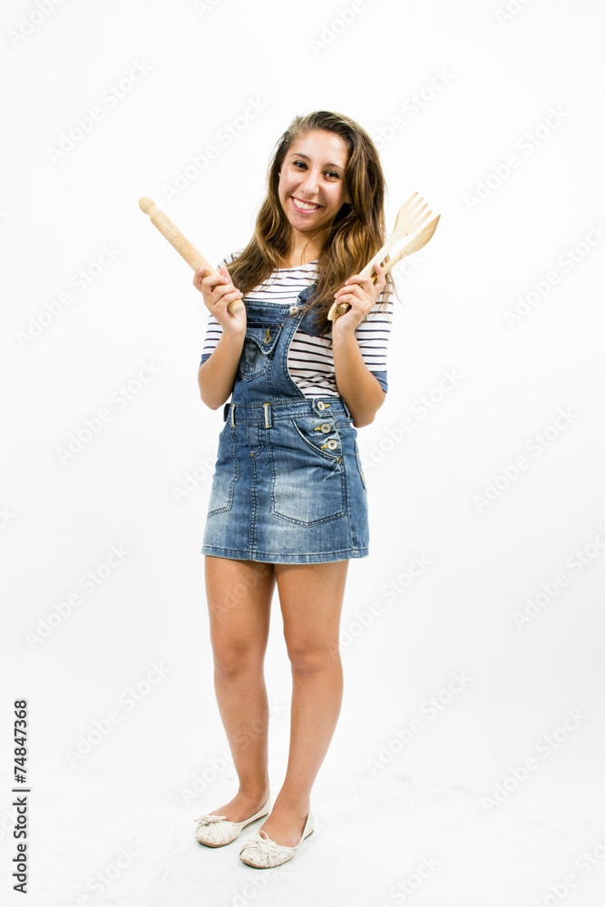 Beautiful smiling girl with kitchen tools Beautiful smiling girl with kitchen tools