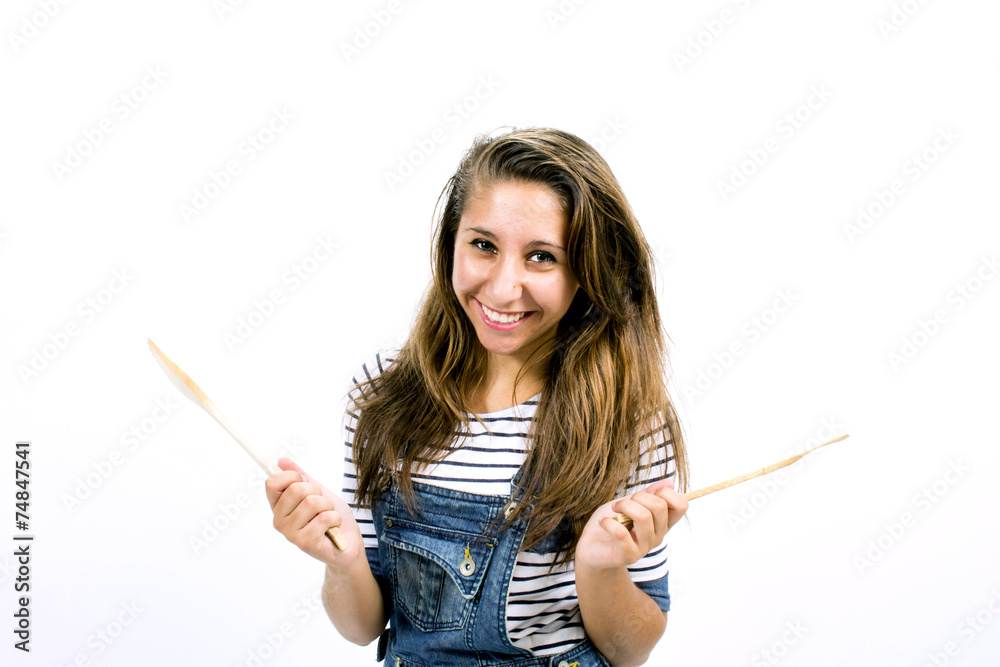Beautiful smiling girl with kitchen tools Beautiful smiling girl with kitchen tools