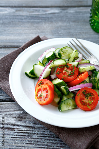 Fresh salad with cucumber and cherry tomatoes