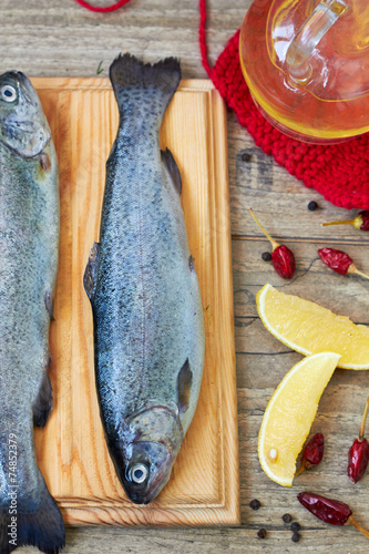 Fresh raw fish trout and spices