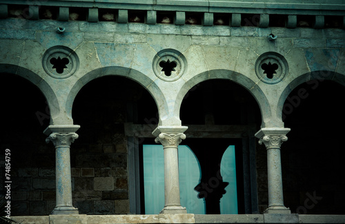 balcony and window in an ancient castle.tinted