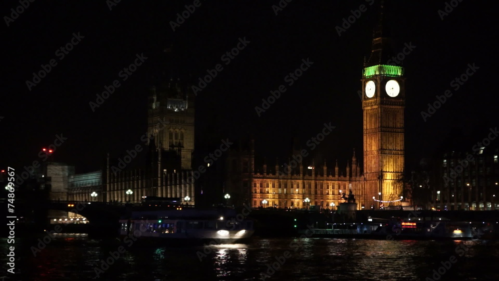 Westminster bridge and Big Ben at night with boat Westminster bridge and Big Ben at night with boat