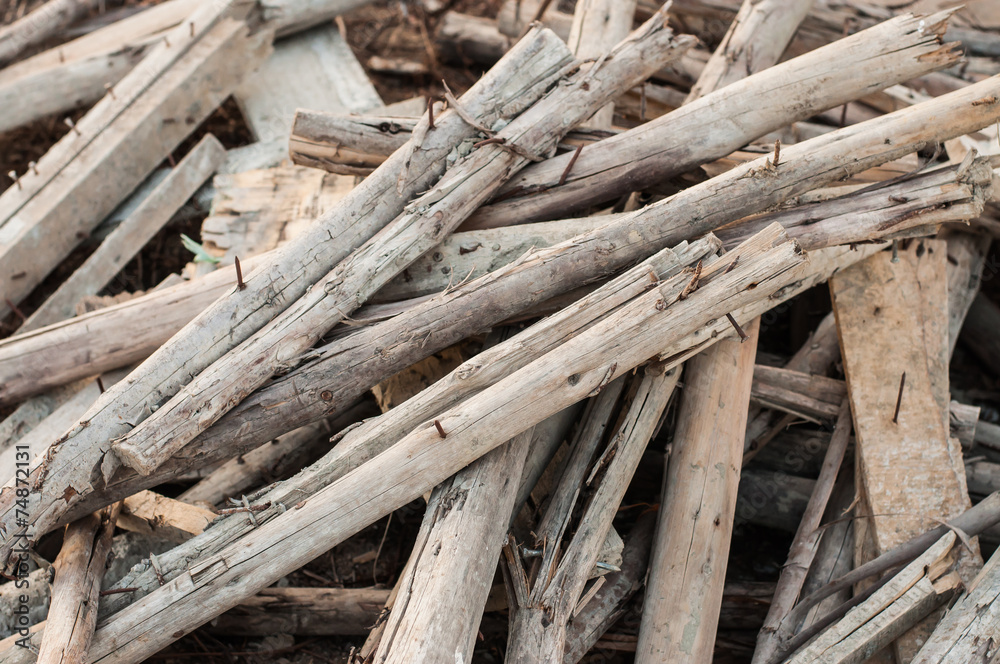 Wooden planks of a demolished house. Wooden planks of a demolished house.