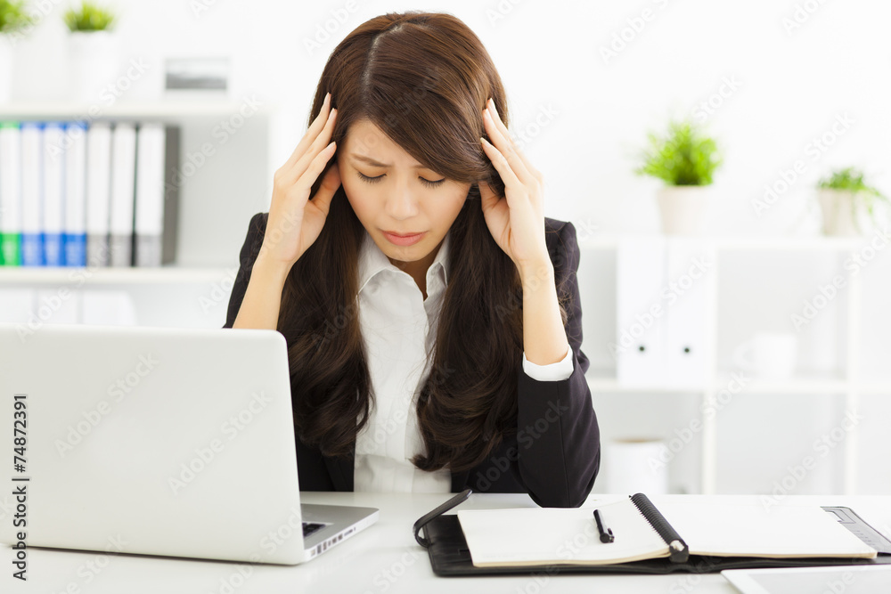 stressed businesswoman sitting in office stressed businesswoman sitting in office