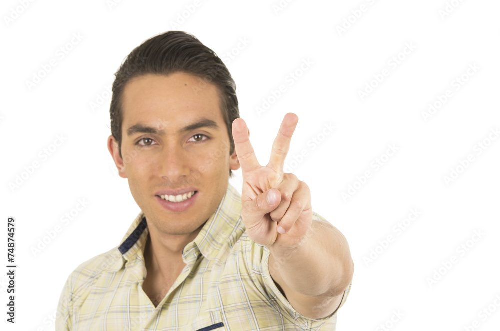 young handsome hispanic man posing gesturing peace sign young handsome hispanic man posing gesturing peace sign
