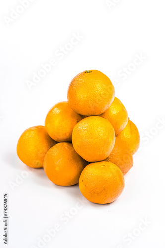 Pyramid of oranges isolated on a white background