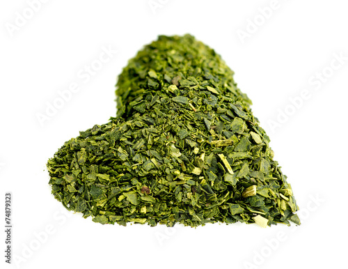 Healthy heart shaped dried green tea