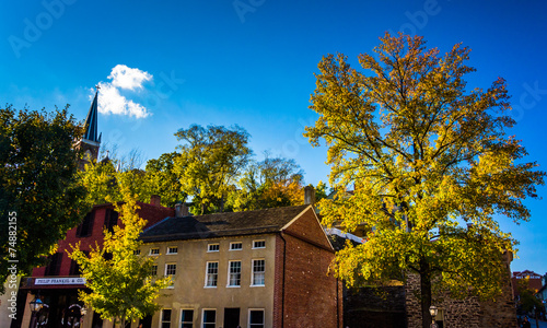 Historic buildings and autumn color in Harpers Ferry, West Virgi © jonbilous
