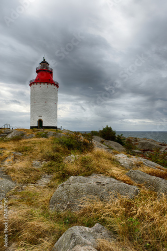 Red lighthouse on the small island in front of Smughen 