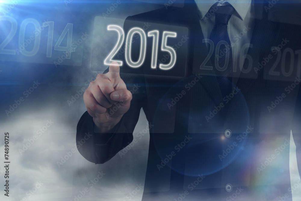 Composite image of businessman in suit pointing finger Composite image of businessman in suit pointing finger
