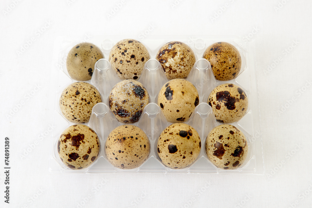 Tray of twelve quails eggs