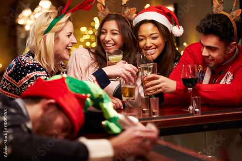 Man Passed Out On Bar During Christmas Drinks With Friends