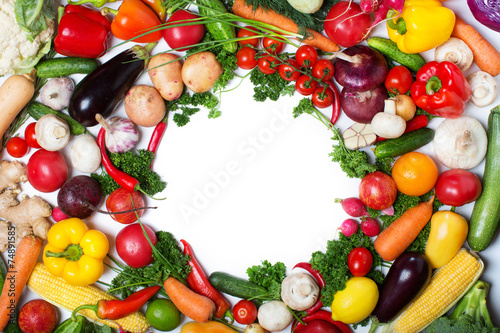 decorative pattern of fresh vegetables on white background