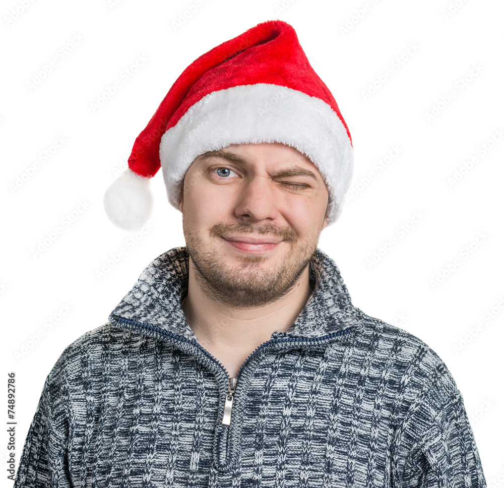 Portrait of a man with red Santa hat. Isolated on white. Portrait of a man with red Santa hat. Isolated on white.