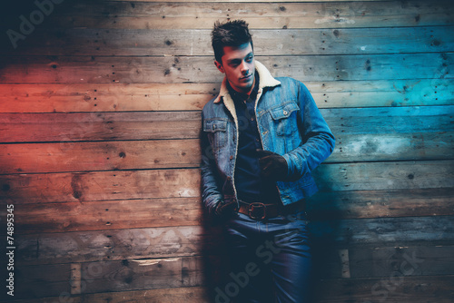 Winter jeans fashion man with short dark hair. Wearing jeans jac photo
