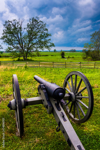Storm clouds over a cannon in Gettysburg, Pennsylvania.