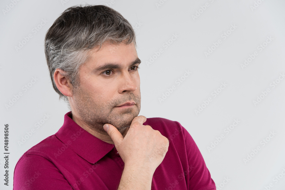 Portrait of thoughtful man with close up view. Portrait of thoughtful man with close up view.