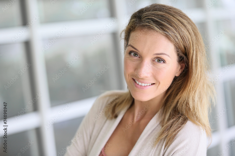 Portrait of beautiful middle-aged blond woman