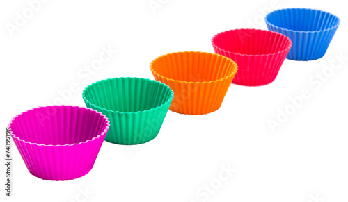 Cupcake silicone baking cups over white background 