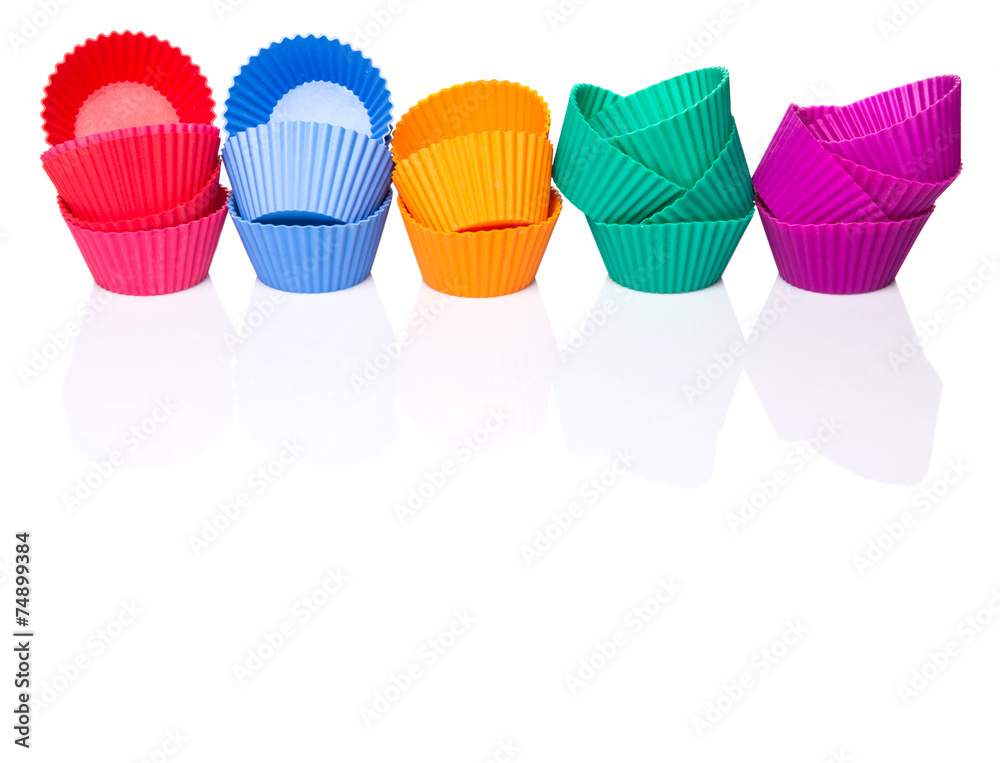 Cupcake silicone baking cups over white background Cupcake silicone baking cups over white background