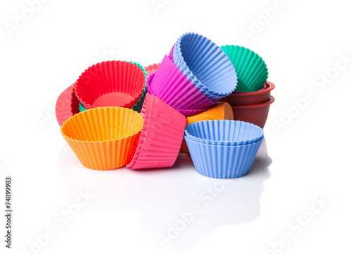 Cupcake silicone baking cups over white background 